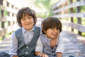 Brothers dressed up nicely for a photo session.