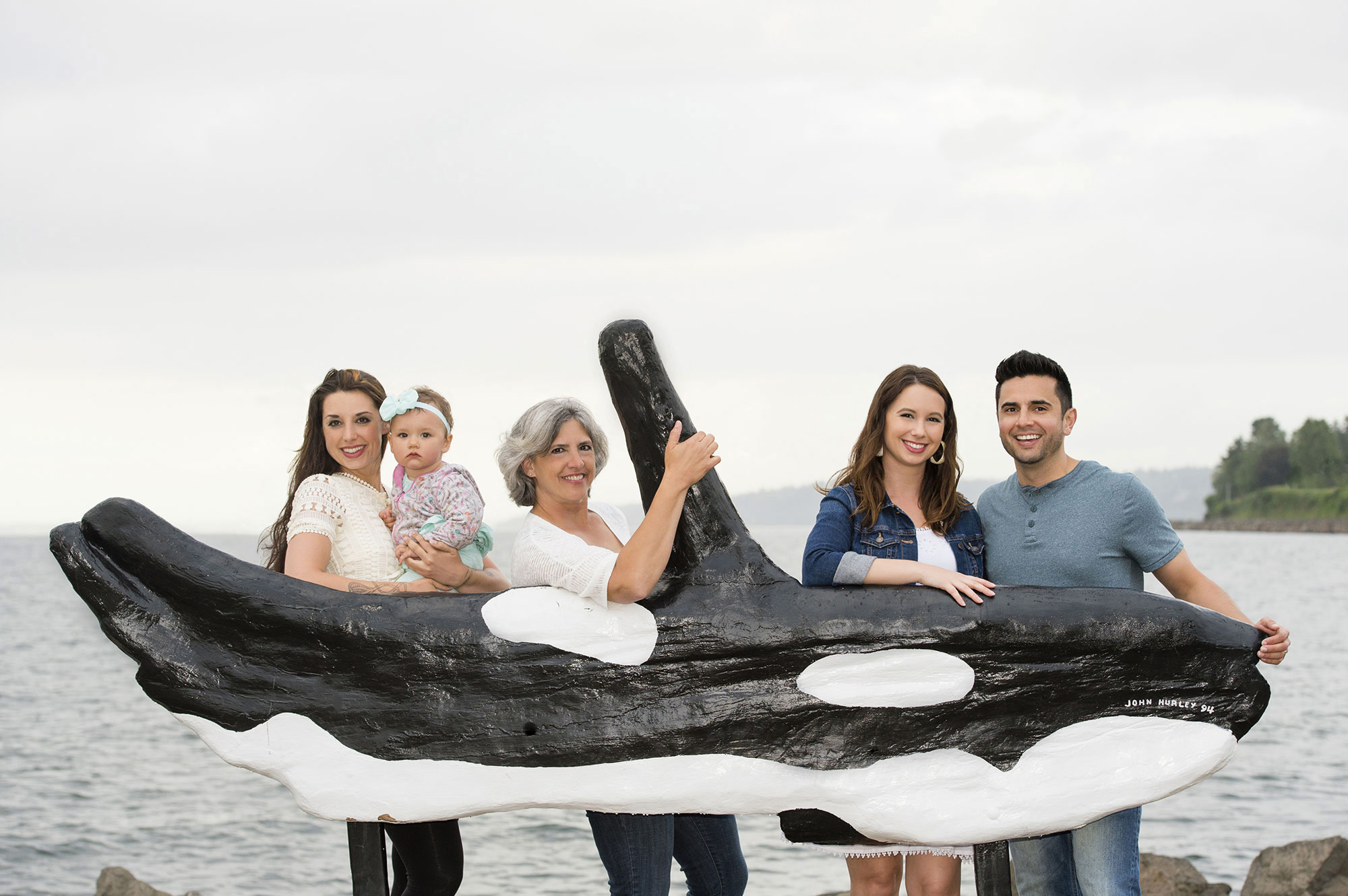Northwest family posing at the waterfront where they live. Family photography, Anita Nowacka.